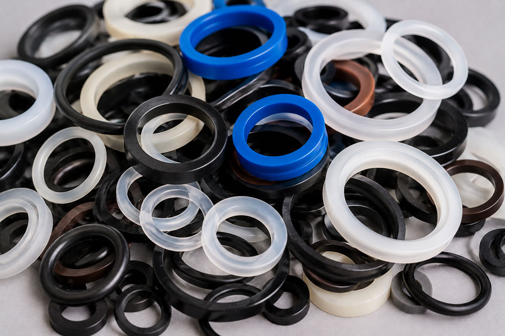 Blue Clear And Black Plastic Rings Machined by Tetrachem Seal Co Inc
