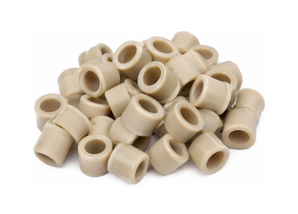 Tan Plastic Machined Part